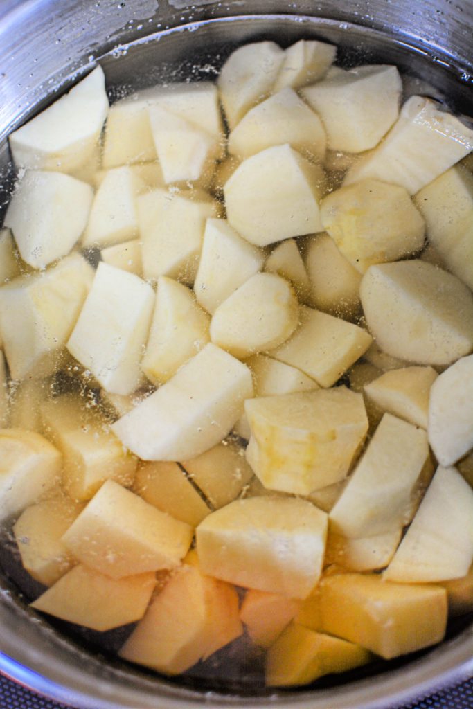 potatoes peeled and cut ready for boiling